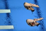 China's Wu Minxia and He Zi dive during the women's synchronised 3m springboard diving event